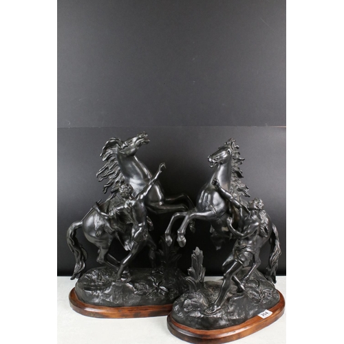 204 - Large Pair of 19th century Spelter rearing Marley Horses with a bronze finish, 57cm high