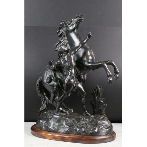 204 - Large Pair of 19th century Spelter rearing Marley Horses with a bronze finish, 57cm high