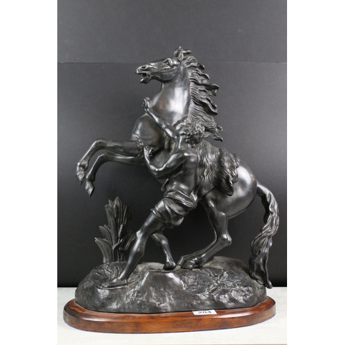 204 - Large Pair of 19th century Spelter rearing Marley Horses with a bronze finish, 57cm high