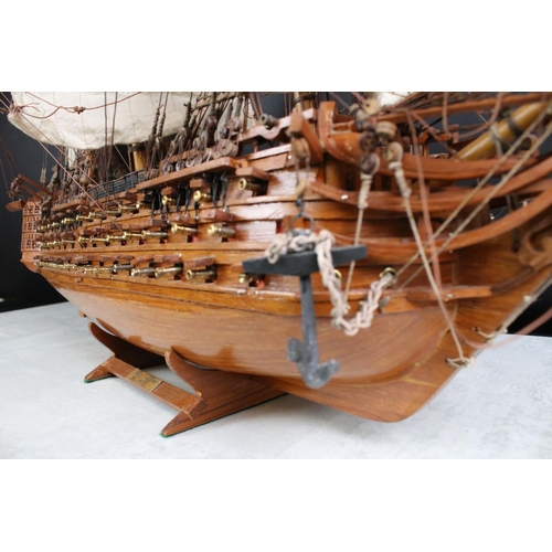 347 - A large wooden model ship / galleon together with a metal tricycle and motorcycle and sidecar model.