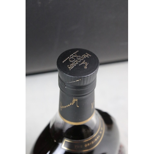 390 - Hennessy & Co X.O. Extra old Cognac, sealed bottle in collectors box.