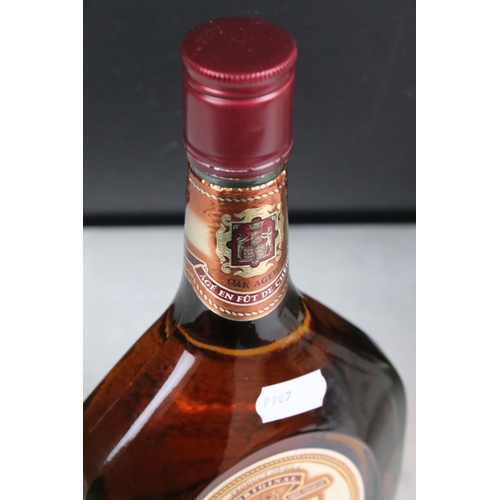 392 - A collection of three sealed bottles of Brandy to include E&J, Hennessy and Courvoisier.