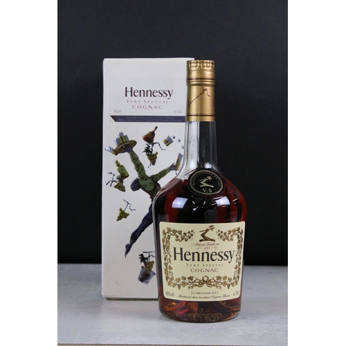 392 - A collection of three sealed bottles of Brandy to include E&J, Hennessy and Courvoisier.