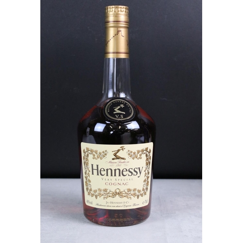 392 - A collection of three sealed bottles of Brandy to include E&J, Hennessy and Courvoisier.