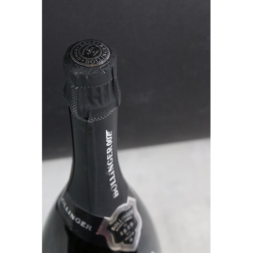 393 - James Bond 'Dressed To Kill' Bollinger Champagne from 2009, sealed bottle.