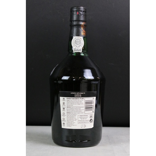 399 - A bottle of Quarles Harris 1977 vintage port together with a bottle of M&S finest reserve port, both... 