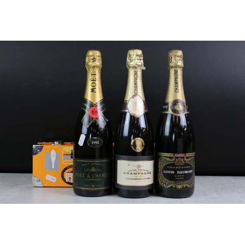 400 - A collection of four bottles of Champagne to include Moet & Chandon, Louis Daumont, Louvel Fontaine ... 