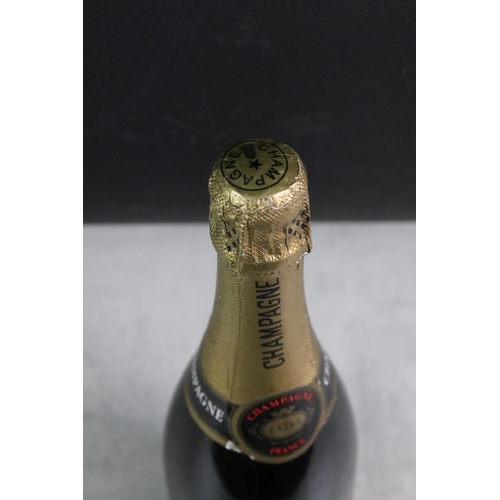 400 - A collection of four bottles of Champagne to include Moet & Chandon, Louis Daumont, Louvel Fontaine ... 