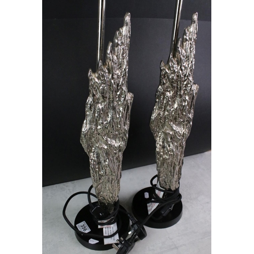 356 - Pair of Table Lamps mounted with a Silvered Flame style decoration, 63cm high