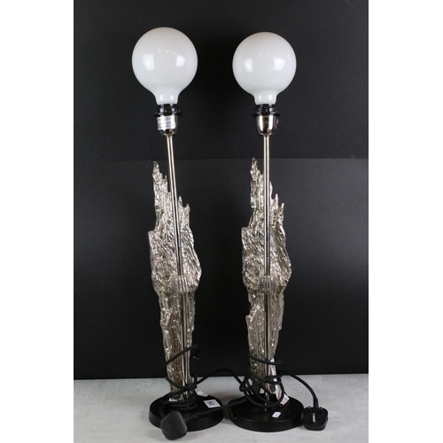 356 - Pair of Table Lamps mounted with a Silvered Flame style decoration, 63cm high