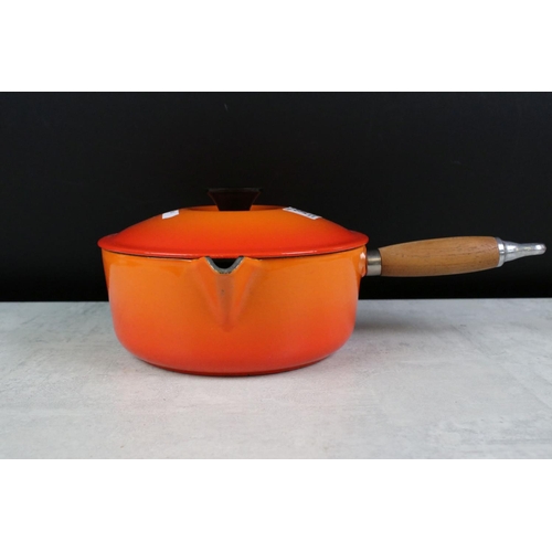 366 - Le Creuset Volcanic set of Four Cast Iron Saucepans, sizes 14, 16, 20 and 22 with three matching lid... 