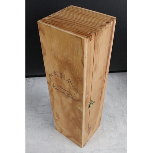 401 - A bottle of Baron De Lustrac Armagnac 1954, sealed bottle within wooden case.