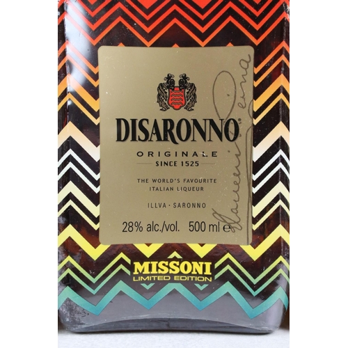 403 - A collection of seven bottles of Disaronno, all sealed bottles.