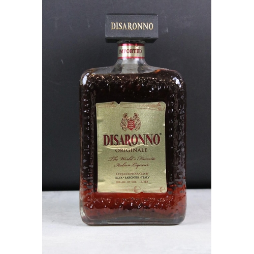 403 - A collection of seven bottles of Disaronno, all sealed bottles.