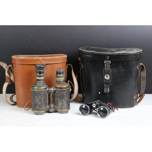 349 - A collection of four pair of vintage binoculars to include Dolland and Barton examples.