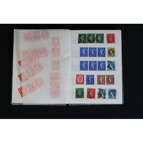 412 - A large collection of mainly British stamps and first day covers, most contained within albums toget... 