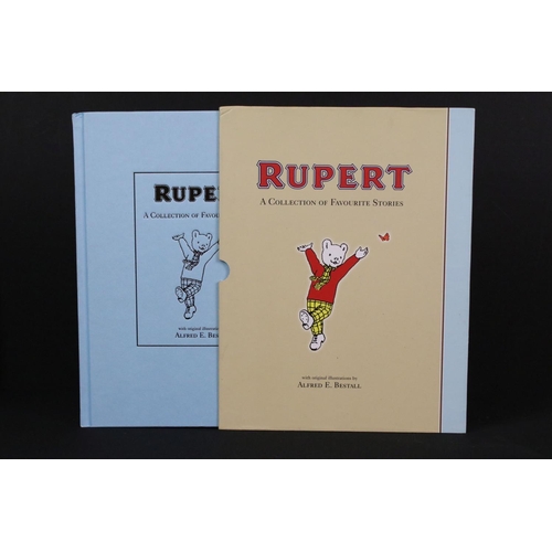 415 - A large collection of approx eighty Rupert the Bear annual and books dating from the 1960's onwards.