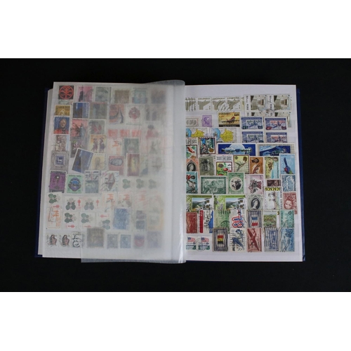 417 - A large collection of mainly British stamps and first covers contained within over fifteen albums.