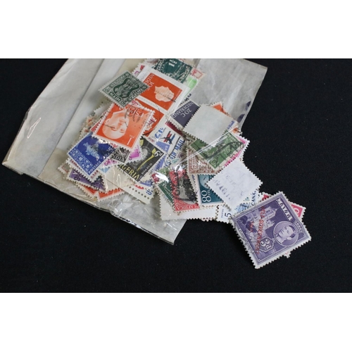 418 - A collection of British, Commonwealth and world stamps contained within albums together with loose e... 