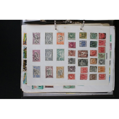 419 - A large collection of mainly world stamps mounted to sheets and contained within seven binders.