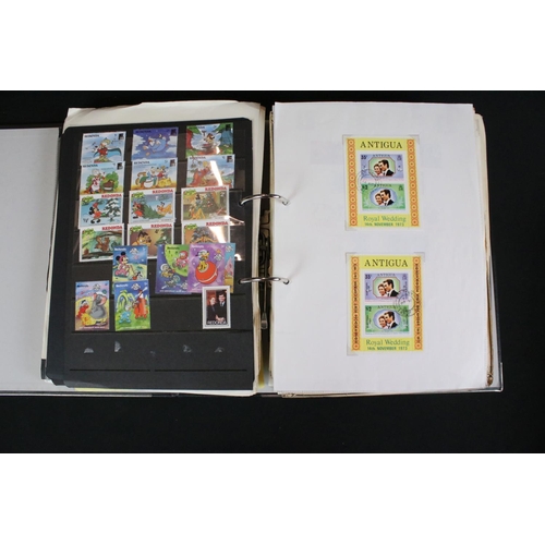 419 - A large collection of mainly world stamps mounted to sheets and contained within seven binders.