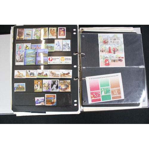 419 - A large collection of mainly world stamps mounted to sheets and contained within seven binders.