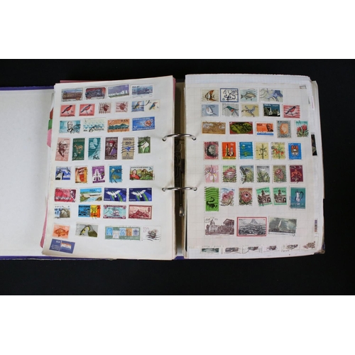 419 - A large collection of mainly world stamps mounted to sheets and contained within seven binders.