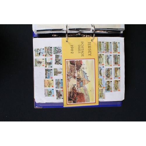 419 - A large collection of mainly world stamps mounted to sheets and contained within seven binders.