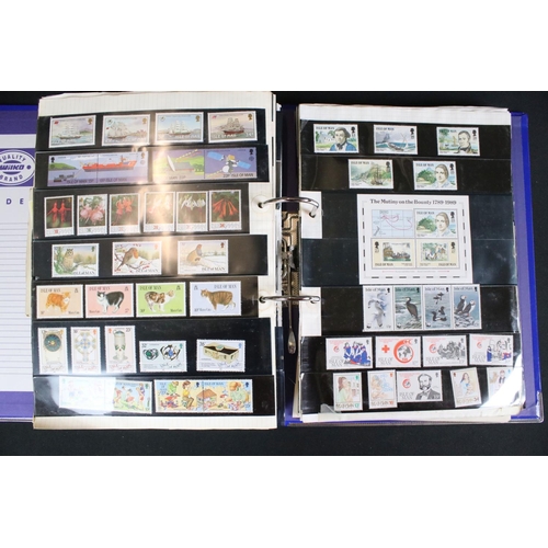 419 - A large collection of mainly world stamps mounted to sheets and contained within seven binders.