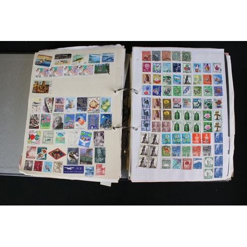 419 - A large collection of mainly world stamps mounted to sheets and contained within seven binders.