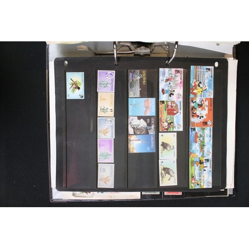 419 - A large collection of mainly world stamps mounted to sheets and contained within seven binders.