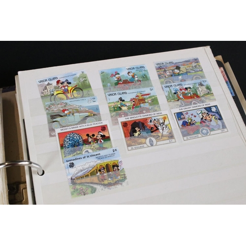 419 - A large collection of mainly world stamps mounted to sheets and contained within seven binders.