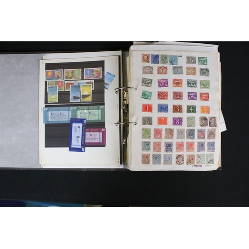 419 - A large collection of mainly world stamps mounted to sheets and contained within seven binders.