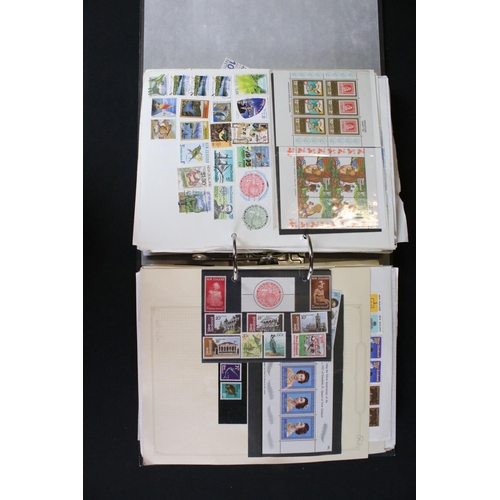 419 - A large collection of mainly world stamps mounted to sheets and contained within seven binders.