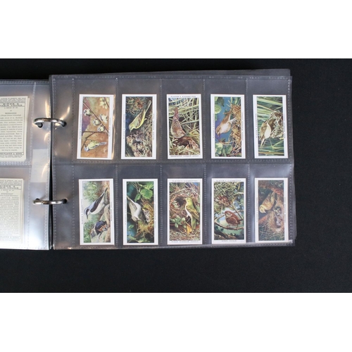 421 - A large collection of mixed cigarette cards, full sets and parts sets to include players, wills ...e... 