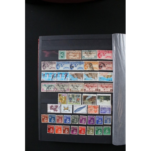 422 - A collection of British, Commonwealth and world stamps contained within over thirteen albums.