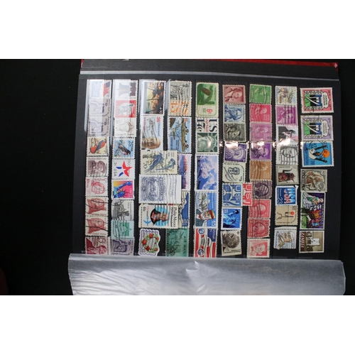 422 - A collection of British, Commonwealth and world stamps contained within over thirteen albums.