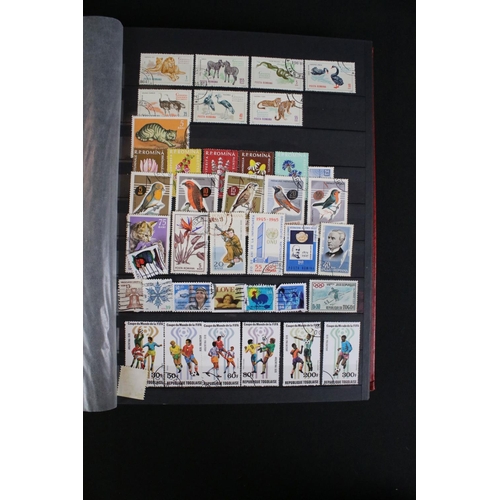 422 - A collection of British, Commonwealth and world stamps contained within over thirteen albums.