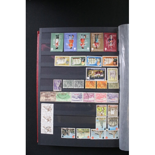 422 - A collection of British, Commonwealth and world stamps contained within over thirteen albums.