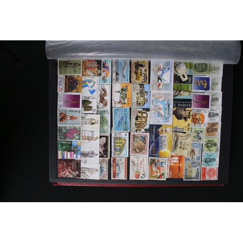 422 - A collection of British, Commonwealth and world stamps contained within over thirteen albums.