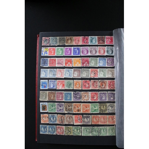 422 - A collection of British, Commonwealth and world stamps contained within over thirteen albums.