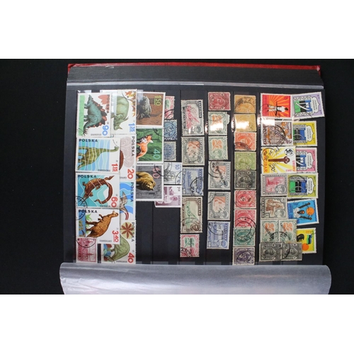 422 - A collection of British, Commonwealth and world stamps contained within over thirteen albums.