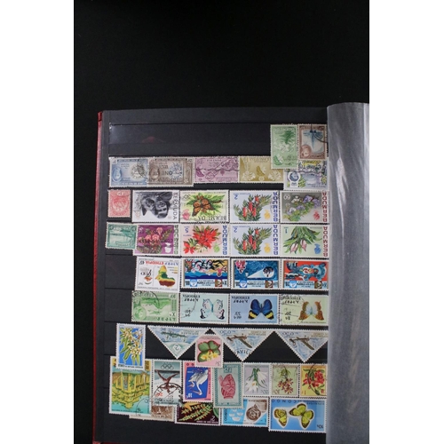 422 - A collection of British, Commonwealth and world stamps contained within over thirteen albums.