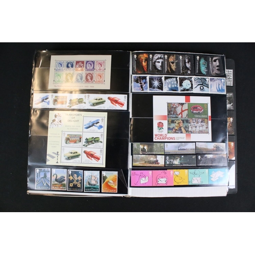 422 - A collection of British, Commonwealth and world stamps contained within over thirteen albums.