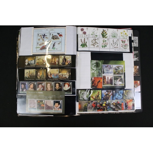 422 - A collection of British, Commonwealth and world stamps contained within over thirteen albums.