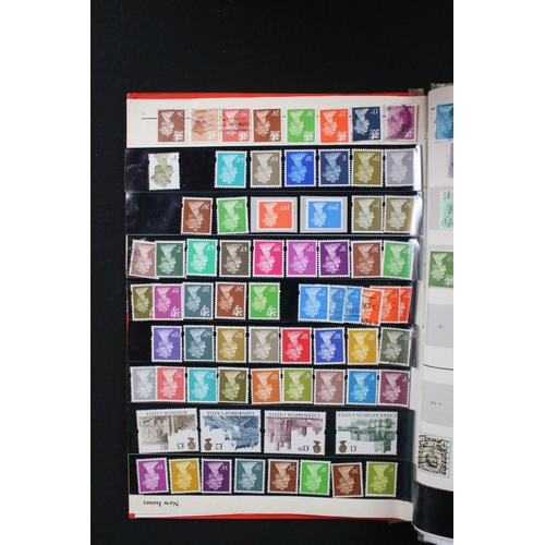 422 - A collection of British, Commonwealth and world stamps contained within over thirteen albums.