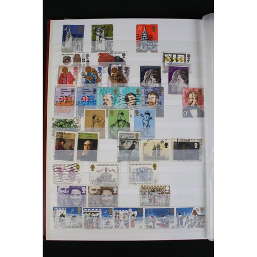 422 - A collection of British, Commonwealth and world stamps contained within over thirteen albums.