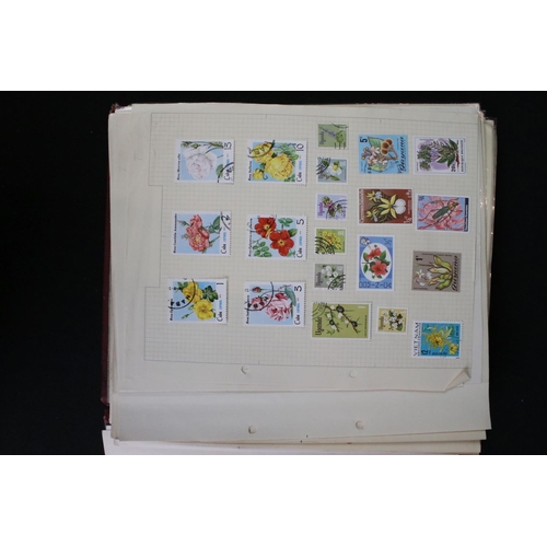 422 - A collection of British, Commonwealth and world stamps contained within over thirteen albums.