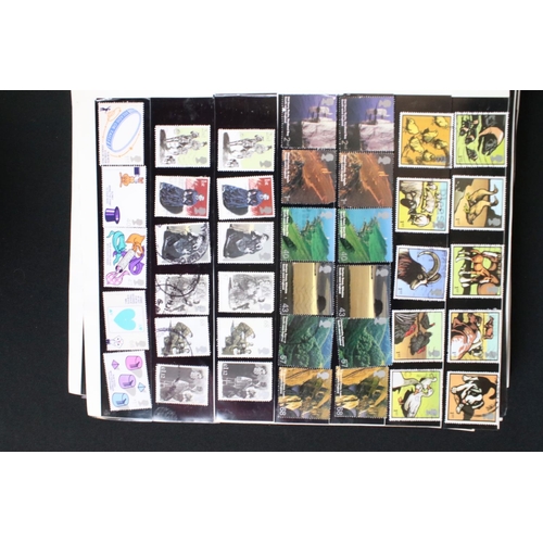 422 - A collection of British, Commonwealth and world stamps contained within over thirteen albums.