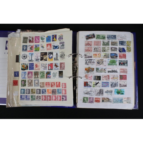 423 - A large collection of mainly world stamps mounted to sheets and contained within nine binders.